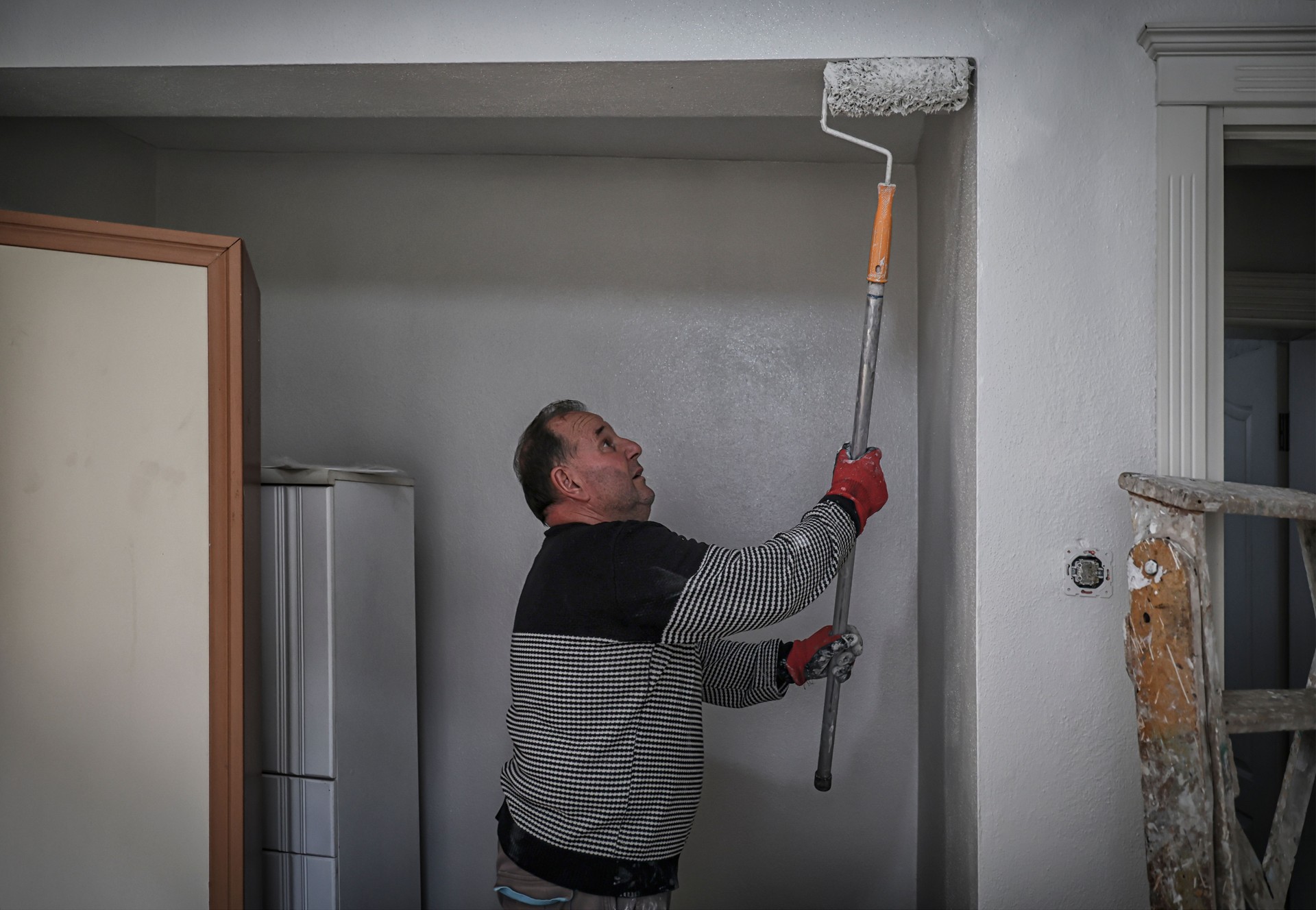 Interior space, the room of the house, painting the house, professional painter, cleaning, painting the walls.